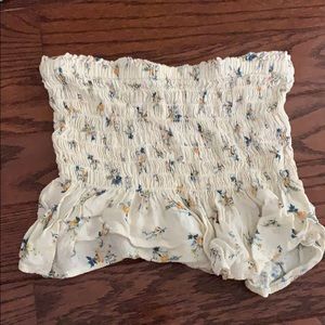 cream tube top with flower pattern